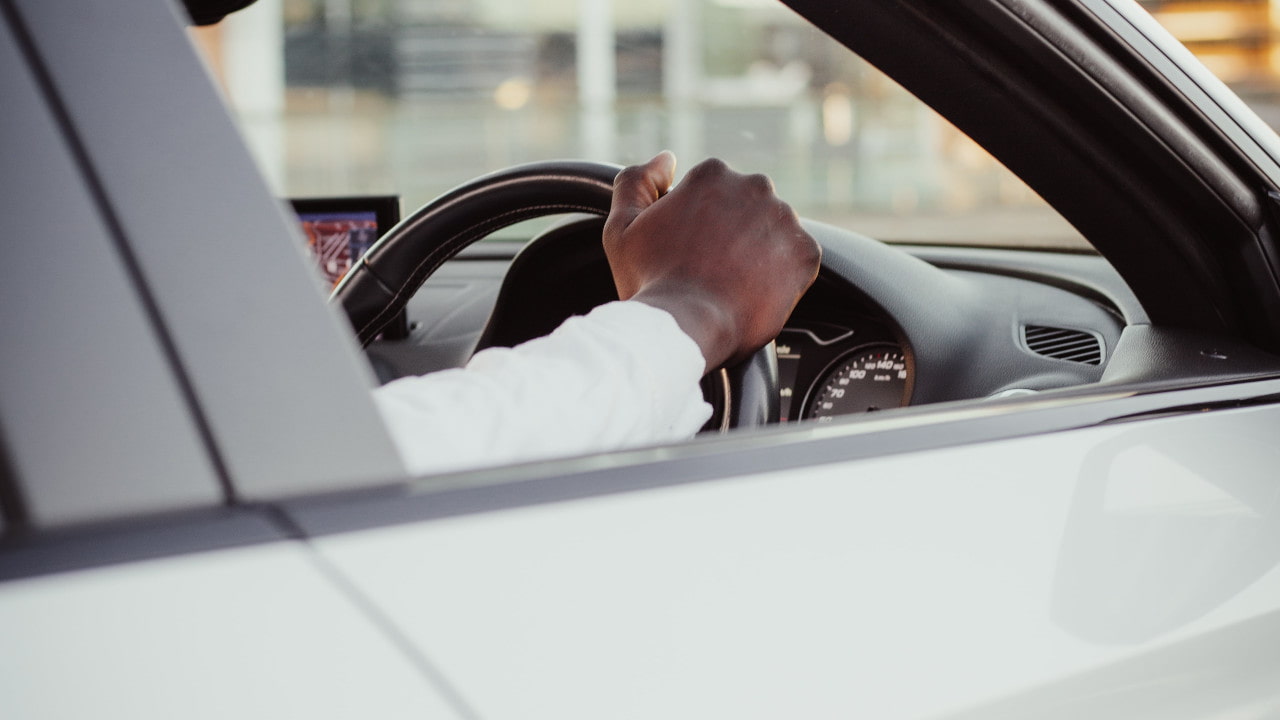 Hand on Steering Wheel