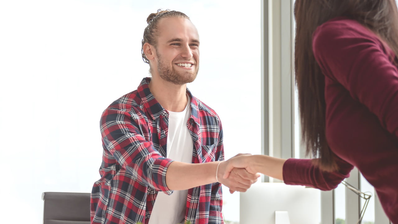 Man and Woman Shaking Hands