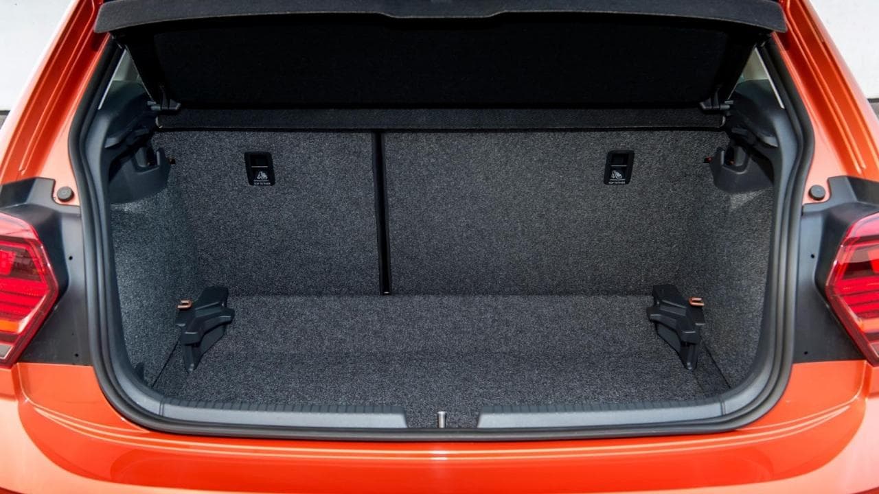 Inside of an orange Volkswagen Polo