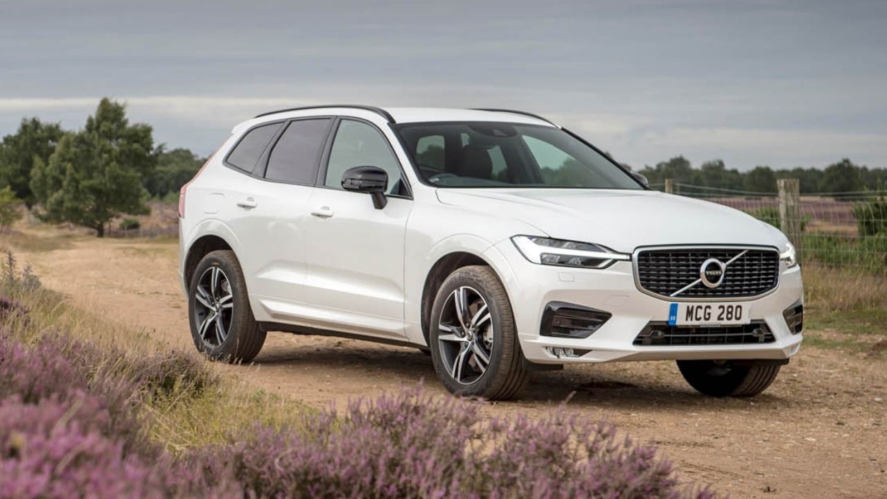 White Volvo XC60 parked in the country side